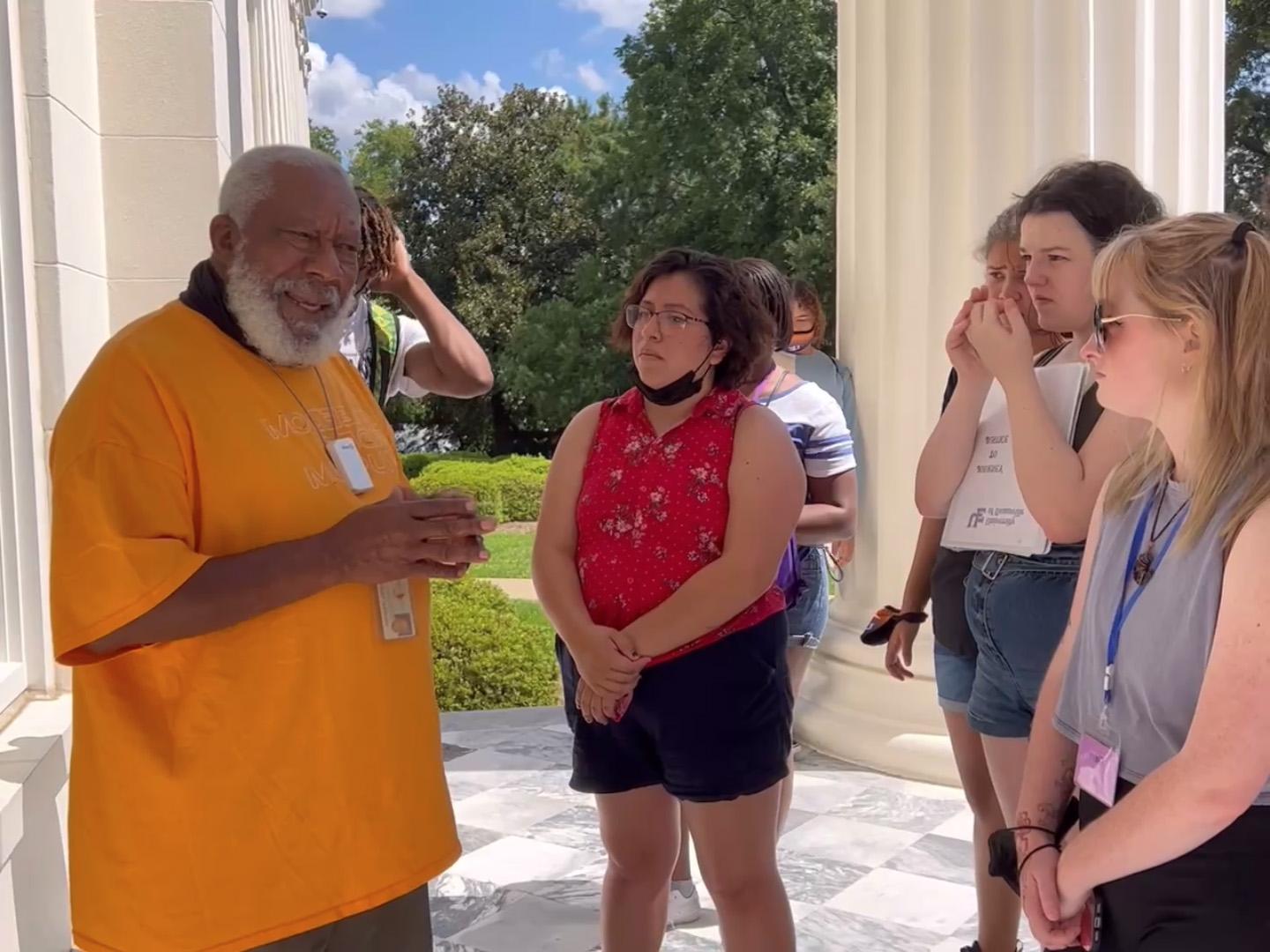 Tour Guide with students in 2022